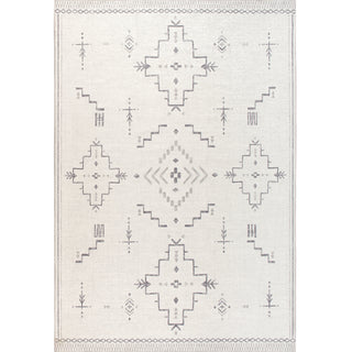 A bohemian style area rug with geometric motifs in a neutral color palette, featuring shades of grey and taupe on a white background.