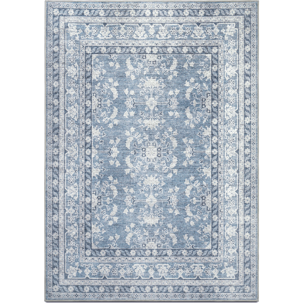 A rectangular rug with a blue background featuring hand-drawn botanical and damask motifs in shades of light and dark blue, and accents of ivory, light grey, and light cream.